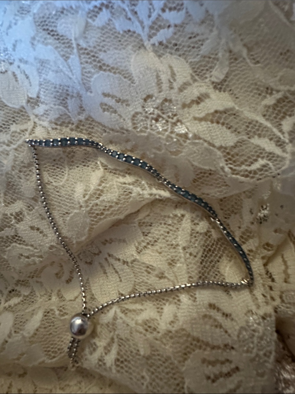 Pandora sterling silver bracelet.   Blue stones.